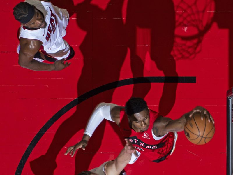 TORONTO, CANADA - JANUARY 17: RJ Barrett #9 of the Toronto Raptors drives to the basket during the game against the Miami Heat on January 17, 2024 at the Scotiabank Arena in Toronto, Ontario, Canada.  NOTE TO USER: User expressly acknowledges and agrees that, by downloading and or using this Photograph, user is consenting to the terms and conditions of the Getty Images License Agreement.  Mandatory Copyright Notice: Copyright 2024 NBAE (Photo by Mark Blinch/NBAE via Getty Images)