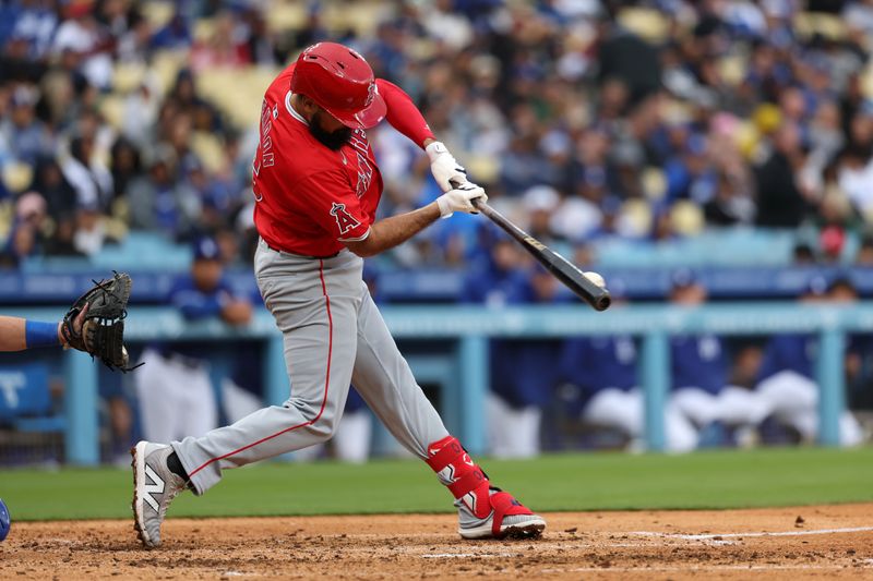 Mar 24, 2024; Los Angeles, California, USA;  Los Angeles Angels third baseman Anthony Rendon (6) grounds out during the fifth inning against the Los Angeles Dodgers at Dodger Stadium. Mandatory Credit: Kiyoshi Mio-USA TODAY Sports