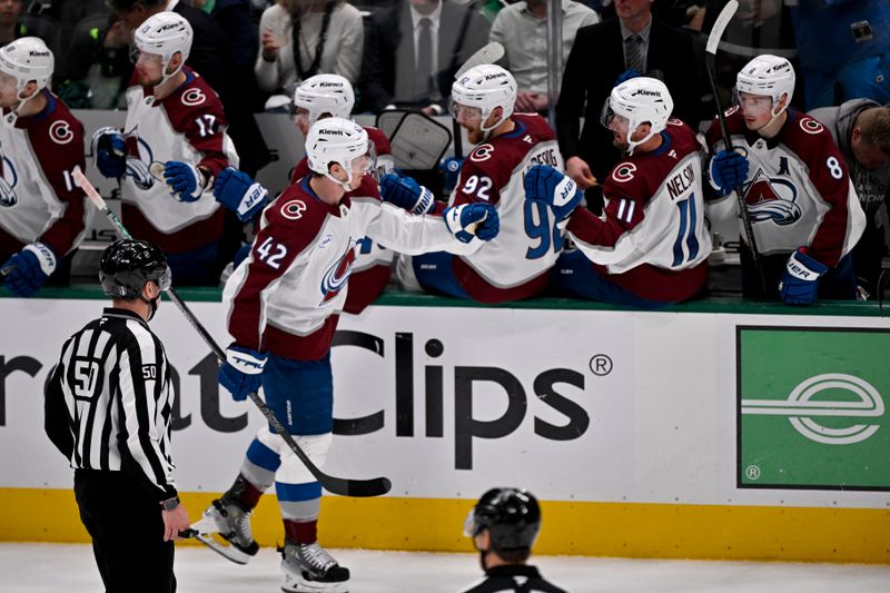 May 3, 2025; Dallas, Texas, USA; Colorado Avalanche defenseman Josh Manson (42) skates past his teammates after he scores a a short-handed goal against the Dallas Stars during the second period in game seven of the first round of the 2025 Stanley Cup Playoffs at American Airlines Center. Mandatory Credit: Jerome Miron-Imagn Images