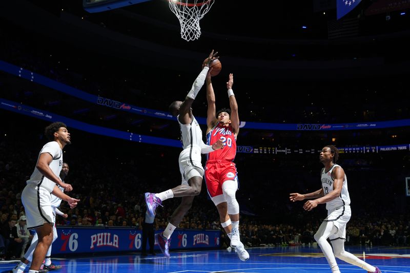 PHILADELPHIA, PA - NOVEMBER 22: Jared McCain #20 of the Philadelphia 76ers drives to the basket during the game against the Brooklyn Nets during the Emirates NBA Cup game on November 22, 2024 at the Wells Fargo Center in Philadelphia, Pennsylvania NOTE TO USER: User expressly acknowledges and agrees that, by downloading and/or using this Photograph, user is consenting to the terms and conditions of the Getty Images License Agreement. Mandatory Copyright Notice: Copyright 2024 NBAE (Photo by Jesse D. Garrabrant/NBAE via Getty Images)