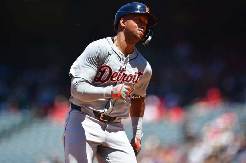 Jun 27, 2024; Anaheim, California, USA; Detroit Tigers designated hitter Justyn-Henry Malloy (44) runs home to score after hitting an inside the park home run against the Los Angeles Angels during the fourth inning at Angel Stadium. Mandatory Credit: Gary A. Vasquez-USA TODAY Sports