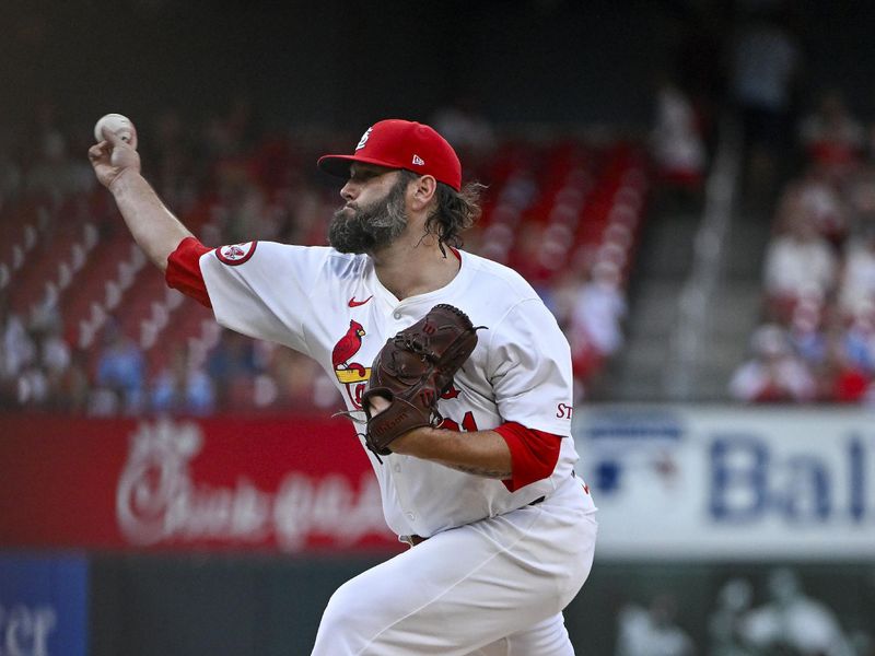 Jul 30, 2024; St. Louis, Missouri, USA;  St. Louis Cardinals starting pitcher Lance Lynn (31) pitches against the Texas Rangers during the first inning at Busch Stadium. Mandatory Credit: Jeff Curry-USA TODAY Sports