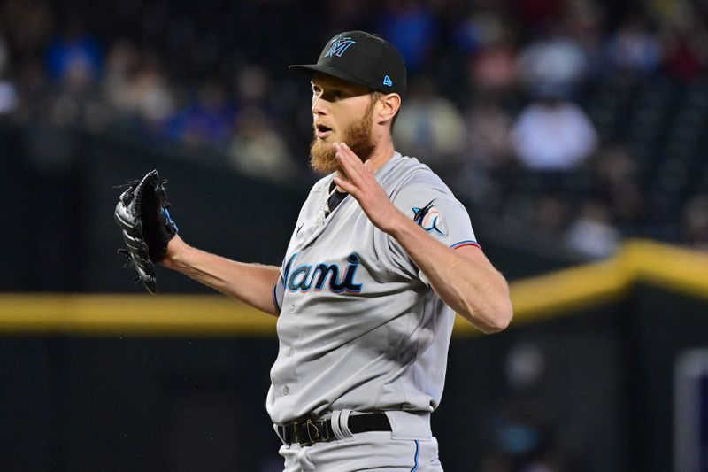 May 10, 2023; Phoenix, Arizona, USA; Miami Marlins relief pitcher A.J. Puk (35) celebrates after beating Arizona Diamondbacks at Chase Field. Mandatory Credit: Matt Kartozian-USA TODAY Sports