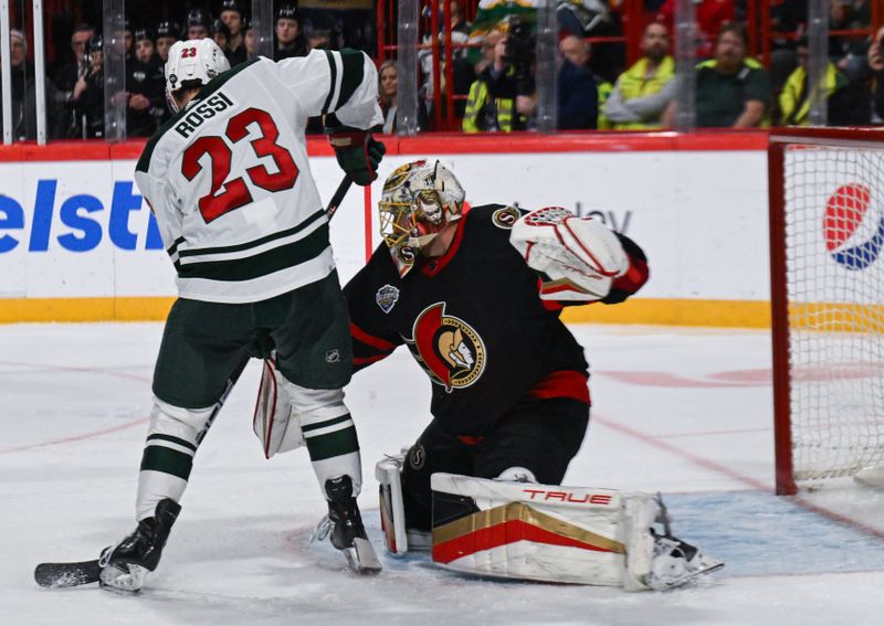 Nov 18, 2023; Stockholm, SWE; Minnesota Wild center Marco Rossi (23) scores a goal against Ottawa Senators goaltender Anton Forsberg (31) during a Global Series NHL hockey game at Avicii Arena. Mandatory Credit: Per Haljestam-USA TODAY Sports