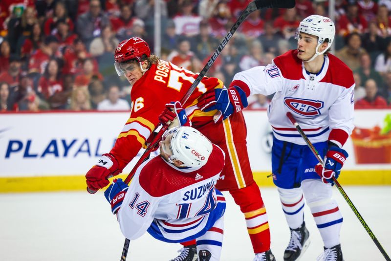 Mar 16, 2024; Calgary, Alberta, CAN; Calgary Flames center Martin Pospisil (76) and Montreal Canadiens center Nick Suzuki (14) gets into a scrum during the second period at Scotiabank Saddledome. Mandatory Credit: Sergei Belski-USA TODAY Sports