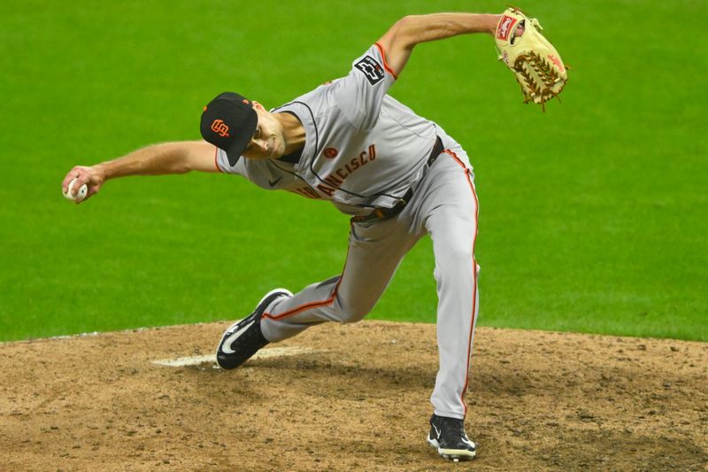 Jul 5, 2024; Cleveland, Ohio, USA; San Francisco Giants relief pitcher Tyler Rogers (71) delivers a pitch in the eighth inning against the Cleveland Guardians at Progressive Field. Mandatory Credit: David Richard-USA TODAY Sports