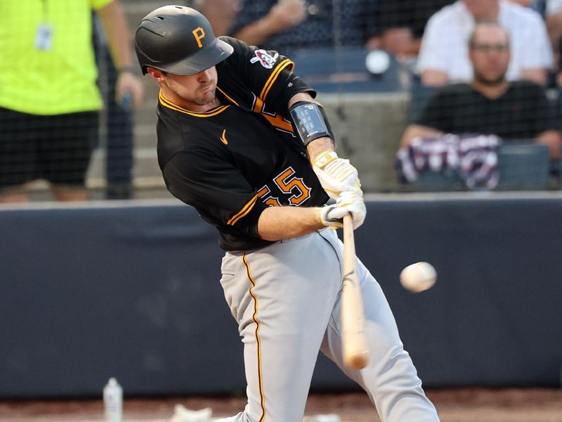 Mar 15, 2024; Tampa, Florida, USA; Pittsburgh Pirates catcher Jason Delay (70) hits a single during the fourth inning against the New York Yankees at George M. Steinbrenner Field. Mandatory Credit: Kim Klement Neitzel-USA TODAY Sports