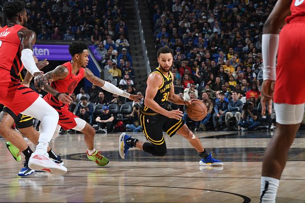 SAN FRANCISCO, CA - DECEMBER 23: Stephen Curry #30 of the Golden State Warriors drives to the basket during the game against the Portland Trail Blazers on December 23, 2023 at Chase Center in San Francisco, California. NOTE TO USER: User expressly acknowledges and agrees that, by downloading and or using this photograph, user is consenting to the terms and conditions of Getty Images License Agreement. Mandatory Copyright Notice: Copyright 2023 NBAE (Photo by Noah Graham/NBAE via Getty Images)