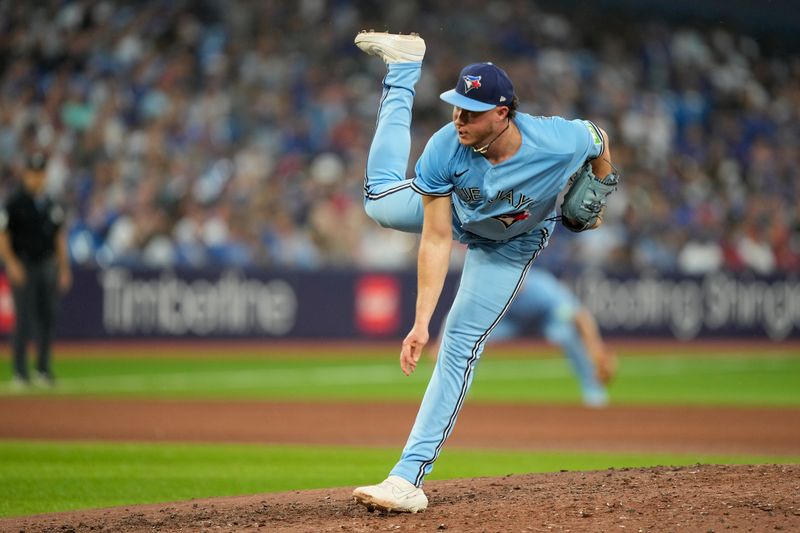 Jul 18, 2023; Toronto, Ontario, CAN; Toronto Blue Jays pitcher Nate Pearson (24) pitches to the pitches to San Diego Padres during the fifth inning at Rogers Centre. Mandatory Credit: John E. Sokolowski-USA TODAY Sports