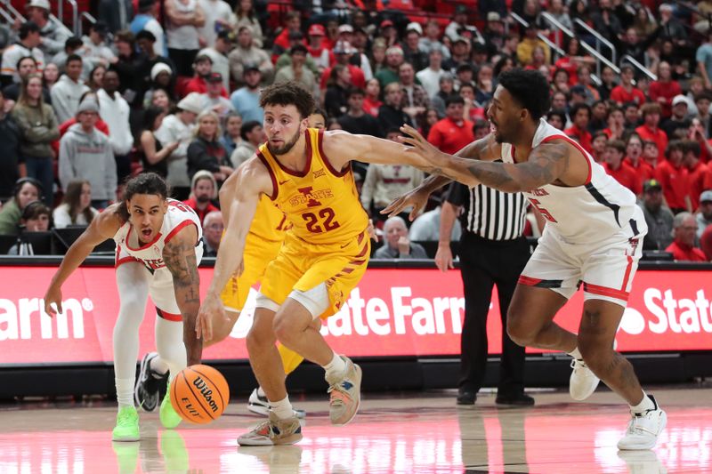 Jan 30, 2023; Lubbock, Texas, USA;  Iowa State Cyclones guard Gabe Kalscheur (22) brings the ball up court against Texas Tech Red Raiders forward KJ Allen (5) and guard Jaylon Tyson (20) in the first half at United Supermarkets Arena. Mandatory Credit: Michael C. Johnson-USA TODAY Sports