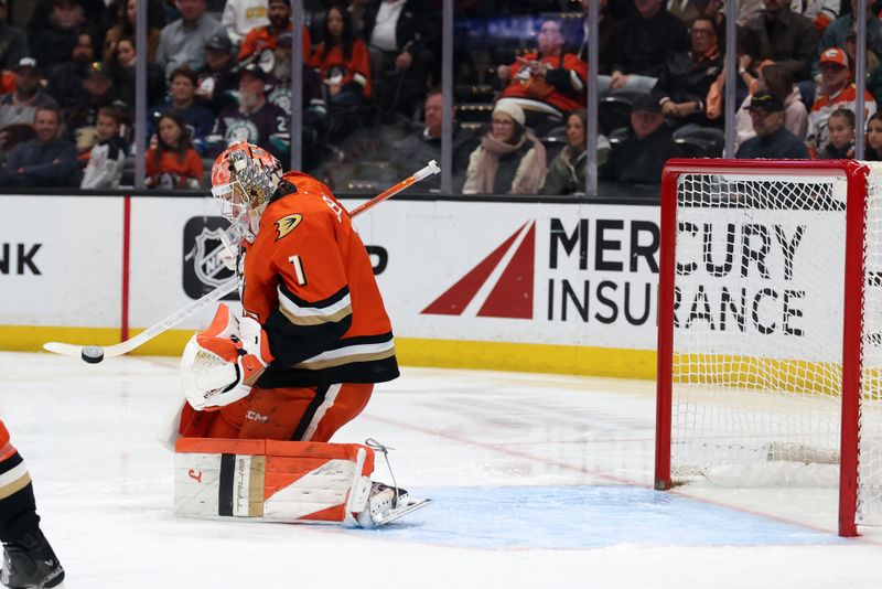Feb 1, 2026; Anaheim, California, USA;  Anaheim Ducks goaltender Lukas Dostal (1) makes a save during the first period against the Vegas Golden Knights at Honda Center. Mandatory Credit: Kiyoshi Mio-Imagn Images
