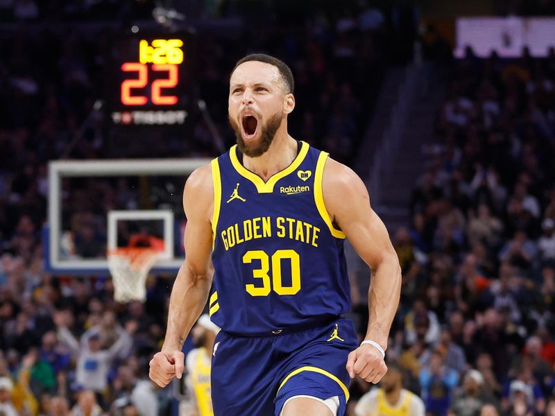 SAN FRANCISCO, CALIFORNIA - FEBRUARY 22: Stephen Curry #30 of the Golden State Warriors reacts after making a three-point shot in the first half against the Los Angeles Lakers at Chase Center on February 22, 2024 in San Francisco, California. NOTE TO USER: User expressly acknowledges and agrees that, by downloading and or using this photograph, User is consenting to the terms and conditions of the Getty Images License Agreement. (Photo by Lachlan Cunningham/Getty Images)