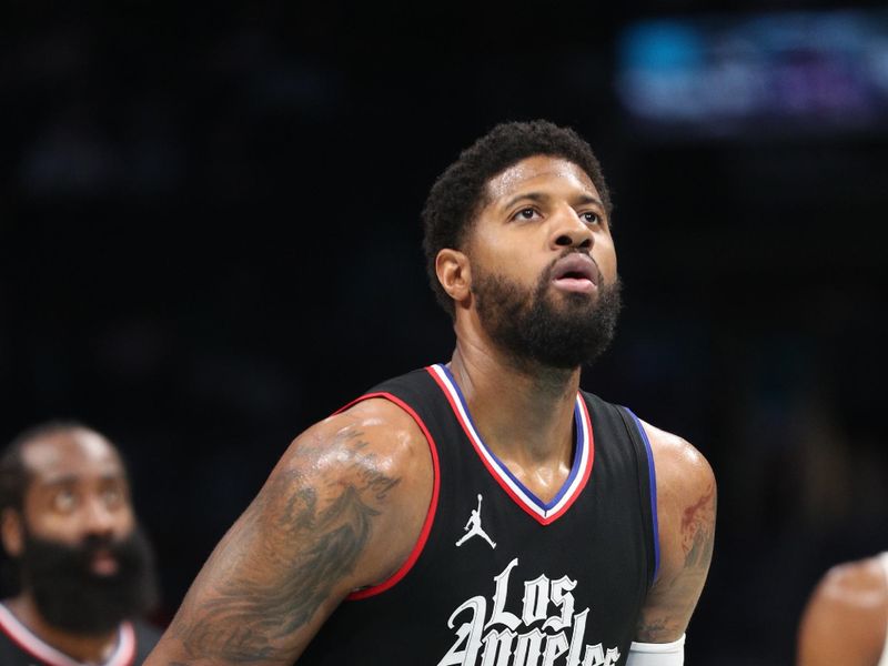 CHARLOTTE, NC - MARCH 31: Paul George #13 of the LA Clippers shoots a free throw during the game against the Charlotte Hornets on March 31, 2024 at Spectrum Center in Charlotte, North Carolina. NOTE TO USER: User expressly acknowledges and agrees that, by downloading and or using this photograph, User is consenting to the terms and conditions of the Getty Images License Agreement.  Mandatory Copyright Notice:  Copyright 2024 NBAE (Photo by Brock Williams-Smith/NBAE via Getty Images)