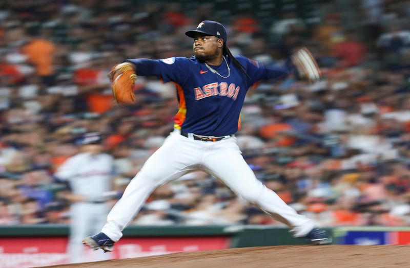 Aug 1, 2023; Houston, Texas, USA; Houston Astros starting pitcher Framber Valdez (59) delivers a pitch during the eighth inning against the Cleveland Guardians at Minute Maid Park. Mandatory Credit: Troy Taormina-USA TODAY Sports