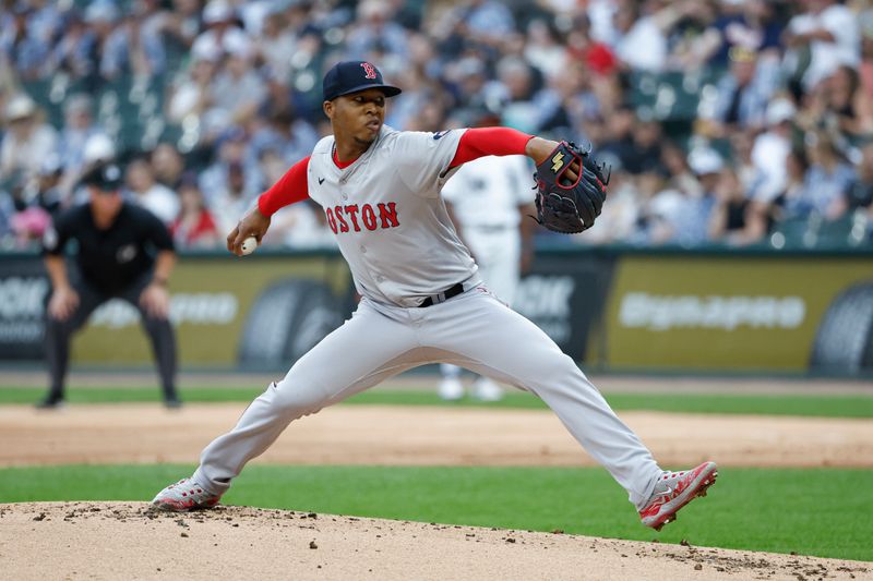 Jun 8, 2024; Chicago, Illinois, USA;  Boston Red Sox starting pitcher Brayan Bello (66) delivers a pitch against the Chicago White Sox during the first inning at Guaranteed Rate Field. Mandatory Credit: Kamil Krzaczynski-USA TODAY Sports