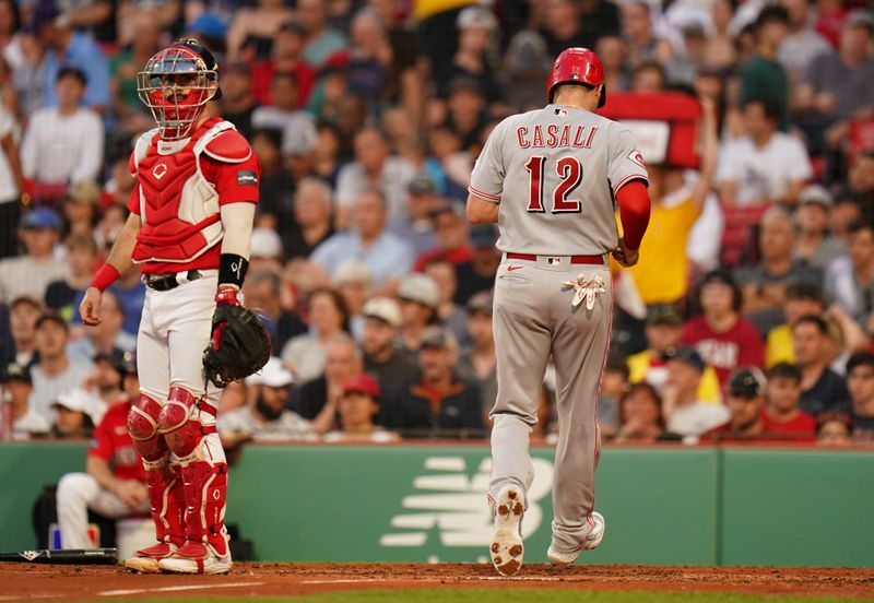 Jun 1, 2023; Boston, Massachusetts, USA; Cincinnati Reds catcher Curt Casali (12) scores against the Boston Red Sox in the third inning at Fenway Park. Mandatory Credit: David Butler II-USA TODAY Sports