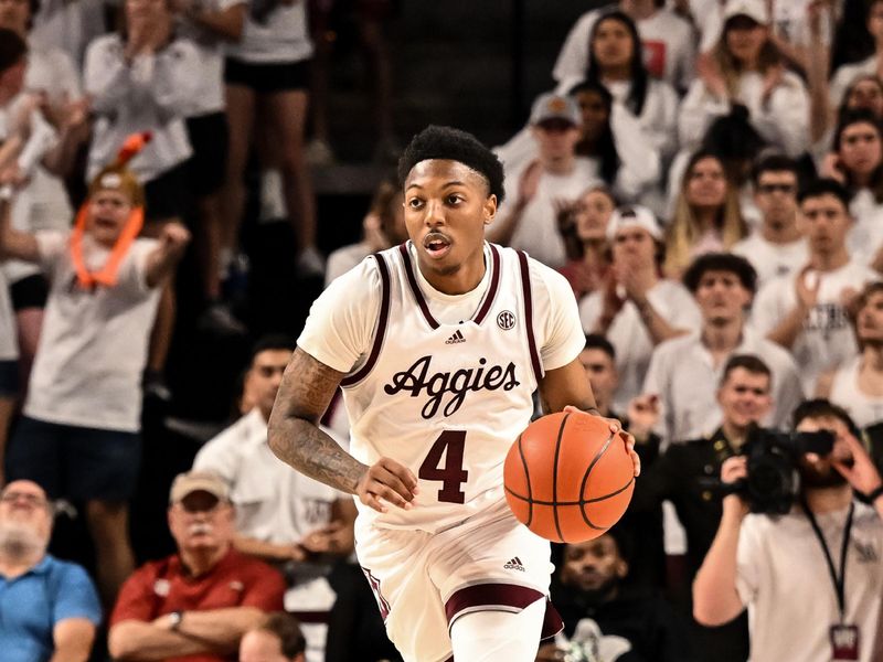 Feb 15, 2023; College Station, Texas, USA;  Texas A&M Aggies guard Wade Taylor IV (4) dribbles the ball during the second half against the Arkansas Razorbacks at Reed Arena. Mandatory Credit: Maria Lysaker-USA TODAY Sports