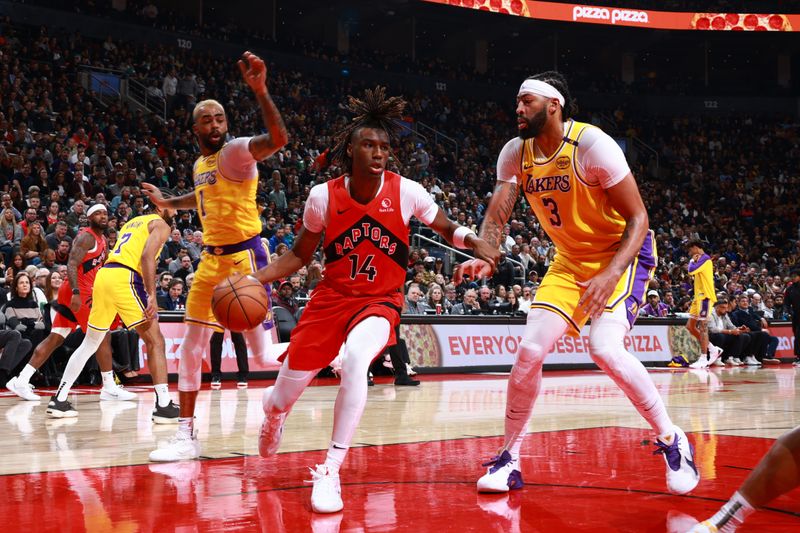 TORONTO, CANADA - NOVEMBER 1: Ja'Kobe Walter #14 of the Toronto Raptors dribbles the ball during the game against the Los Angeles Lakers on November 1, 2024 at the Scotiabank Arena in Toronto, Ontario, Canada.  NOTE TO USER: User expressly acknowledges and agrees that, by downloading and or using this Photograph, user is consenting to the terms and conditions of the Getty Images License Agreement.  Mandatory Copyright Notice: Copyright 2024 NBAE (Photo by Vaughn Ridley/NBAE via Getty Images)