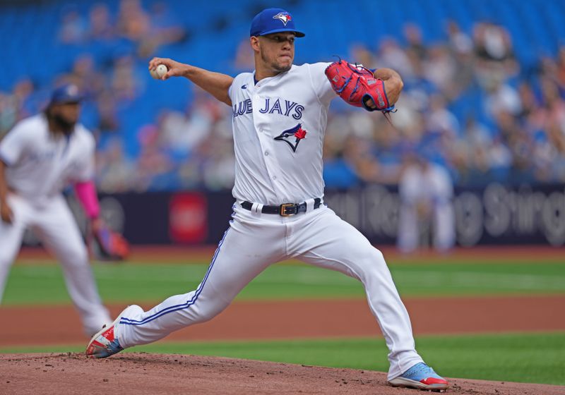 Sep 10, 2023; Toronto, Ontario, CAN; Toronto Blue Jays starting pitcher Jose Berrios (17) throws a pitch against the Kansas City Royals during the first inning at Rogers Centre. Mandatory Credit: Nick Turchiaro-USA TODAY Sports