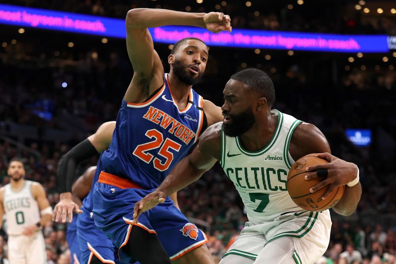BOSTON, MASSACHUSETTS - MAY 05: Jaylen Brown #7 of the Boston Celtics drives the ball against Mikal Bridges #25 of the New York Knicks during the fourth quarter in Game One of the Eastern Conference Second Round NBA Playoffs at TD Garden on May 05, 2025 in Boston, Massachusetts. NOTE TO USER: User expressly acknowledges and agrees that, by downloading and or using this photograph, User is consenting to the terms and conditions of the Getty Images License Agreement. (Photo by Maddie Meyer/Getty Images)