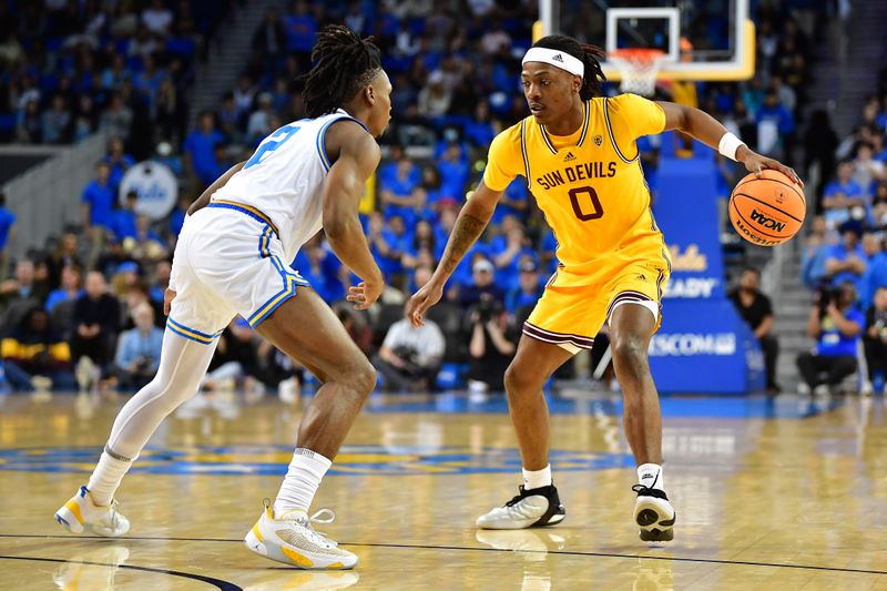 Mar 2, 2023; Los Angeles, California, USA; Arizona State Sun Devils guard DJ Horne (0) controls the ball against UCLA Bruins guard Dylan Andrews (2) during the first half at Pauley Pavilion. Mandatory Credit: Gary A. Vasquez-USA TODAY Sports