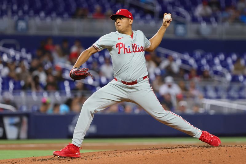 Sep 5, 2024; Miami, Florida, USA; Philadelphia Phillies starting pitcher Ranger Suarez (55) delivers a pitch against the Miami Marlins during the first inning at loanDepot Park. Mandatory Credit: Sam Navarro-Imagn Images