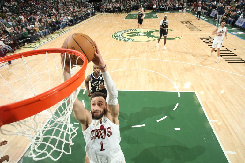 MILWAUKEE, WI - JANUARY 26:  Max Strus #1 of the Cleveland Cavaliers drives to the basket during the game  against the Milwaukee Bucks on January 26, 2024 at the Fiserv Forum Center in Milwaukee, Wisconsin. NOTE TO USER: User expressly acknowledges and agrees that, by downloading and or using this Photograph, user is consenting to the terms and conditions of the Getty Images License Agreement. Mandatory Copyright Notice: Copyright 2024 NBAE (Photo by Gary Dineen/NBAE via Getty Images).