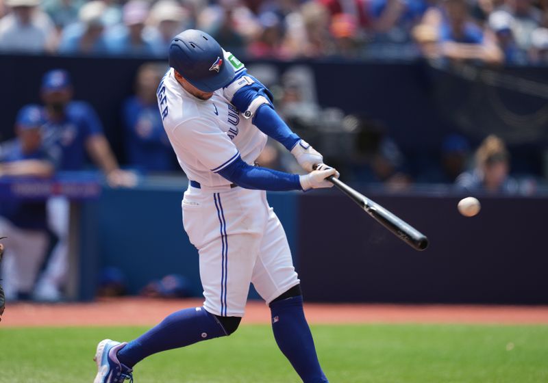 Jul 16, 2023; Toronto, Ontario, CAN; Toronto Blue Jays right fielder George Springer (4) hits a double against the Arizona Diamondbacks during the second inning at Rogers Centre. Mandatory Credit: Nick Turchiaro-USA TODAY Sports