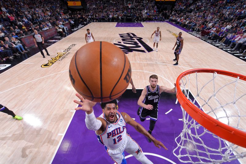 SACRAMENTO, CA - MARCH 25:  Tobias Harris #12 of the Philadelphia 76ers goes to the basket during the game on March 25, 2024 at Golden 1 Center in Sacramento, California. NOTE TO USER: User expressly acknowledges and agrees that, by downloading and or using this Photograph, user is consenting to the terms and conditions of the Getty Images License Agreement. Mandatory Copyright Notice: Copyright 2024 NBAE (Photo by Rocky Widner/NBAE via Getty Images)