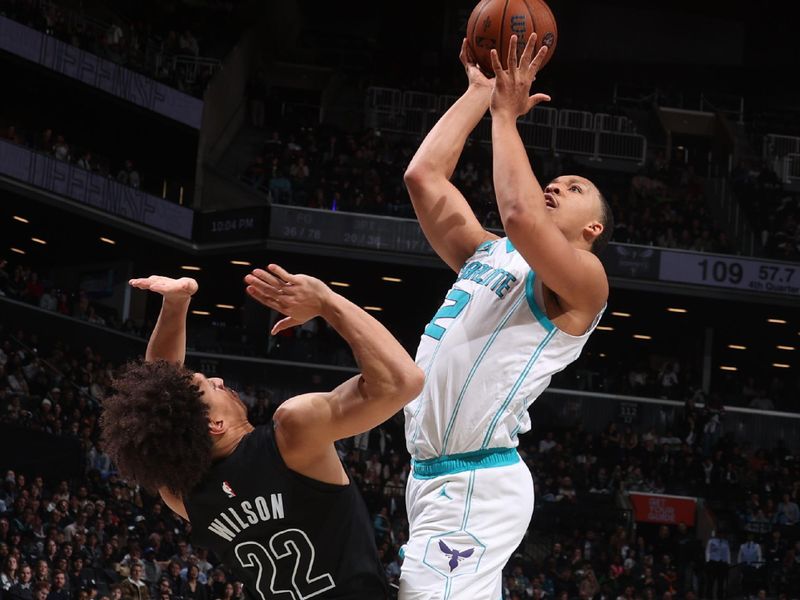 BROOKLYN, NY - NOVEMBER 19: Grant Williams #2 of the Charlotte Hornets drives to the basket during the game against the Brooklyn Nets during an Emirates NBA Cup game on November 19, 2024 at Barclays Center in Brooklyn, New York. NOTE TO USER: User expressly acknowledges and agrees that, by downloading and or using this Photograph, user is consenting to the terms and conditions of the Getty Images License Agreement. Mandatory Copyright Notice: Copyright 2024 NBAE (Photo by Nathaniel S. Butler/NBAE via Getty Images)