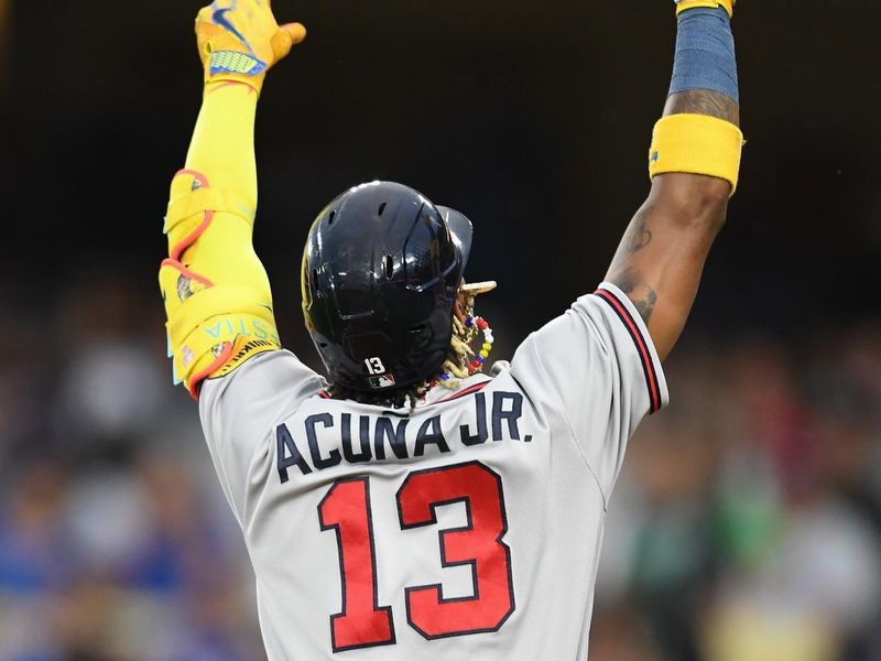 Sep 2, 2023; Los Angeles, California, USA; Atlanta Braves right fielder Ronald Acuna Jr. (13) celebrates after hitting a home run against the Los Angeles Dodgers during the third inning at Dodger Stadium. Mandatory Credit: Jonathan Hui-USA TODAY Sports