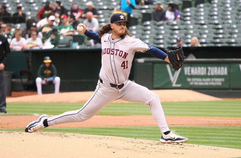 May 25, 2024; Oakland, California, USA; Houston Astros starting pitcher Spencer Arrighetti (41) pitches the ball Oakland Athletics during the first inning at Oakland-Alameda County Coliseum. Mandatory Credit: Kelley L Cox-USA TODAY Sports