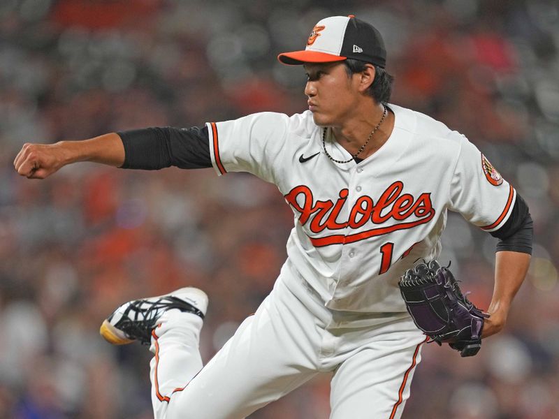 Aug 9, 2023; Baltimore, Maryland, USA; Baltimore Orioles pitcher Shintaro Fujinami (14) delivers in the eighth inning at Oriole Park at Camden Yards. Mandatory Credit: Mitch Stringer-USA TODAY Sports