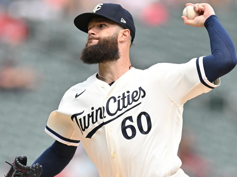 Aug 20, 2023; Minneapolis, Minnesota, USA; Minnesota Twins starting pitcher Dallas Keuchel (60) throws a pitch against the Pittsburgh Pirates during the first inning at Target Field. Mandatory Credit: Jeffrey Becker-USA TODAY Sports