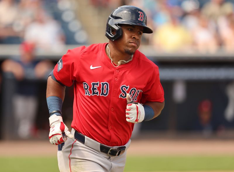 Mar 13, 2024; Tampa, Florida, USA; Boston Red Sox second baseman Enmanuel Valdez (47) hits a home run during the fifth inning against the New York Yankees at George M. Steinbrenner Field. Mandatory Credit: Kim Klement Neitzel-USA TODAY Sports