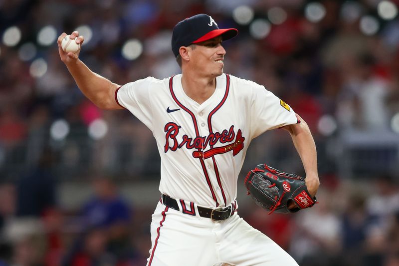 May 30, 2024; Atlanta, Georgia, USA; Atlanta Braves relief pitcher Jimmy Herget (64) throws against the Washington Nationals in the eighth inning at Truist Park. Mandatory Credit: Brett Davis-USA TODAY Sports