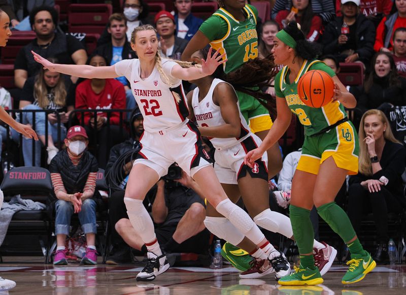 Jan 29, 2023; Stanford, California, USA; Stanford Cardinal forward Cameron Brink (22) on defense against Oregon Ducks guard Te-Hina Paopao (12) during the third quarter at Maples Pavilion. Mandatory Credit: Kelley L Cox-USA TODAY Sports