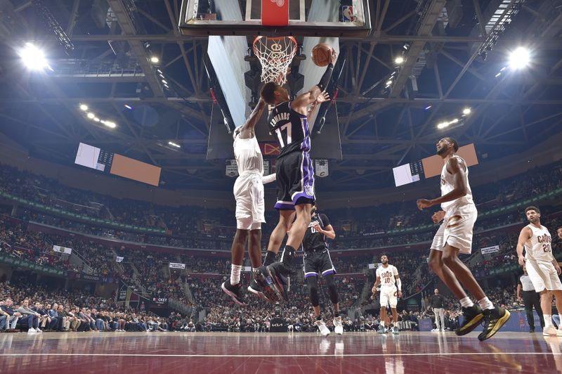 CLEVELAND, OH - FEBRUARY 5: Kessler Edwards #17 of the Sacramento Kings shoots the ball during the game against the Cleveland Cavaliers on February 5, 2024 at Rocket Mortgage FieldHouse in Cleveland, Ohio. NOTE TO USER: User expressly acknowledges and agrees that, by downloading and/or using this Photograph, user is consenting to the terms and conditions of the Getty Images License Agreement. Mandatory Copyright Notice: Copyright 2024 NBAE (Photo by David Liam Kyle/NBAE via Getty Images)