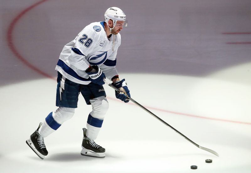Nov 19, 2024; Pittsburgh, Pennsylvania, USA; Tampa Bay Lightning center Zemgus Girgensons (28) takes the ice to warm up before the game against the Pittsburgh Penguins at PPG Paints Arena. Mandatory Credit: Charles LeClaire-Imagn Images