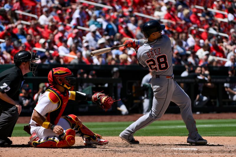 May 21, 2025; St. Louis, Missouri, USA;  Detroit Tigers center fielder Javier Baez (28) hits a one run single against the St. Louis Cardinals during the eighth inning at Busch Stadium. Mandatory Credit: Jeff Curry-Imagn Images