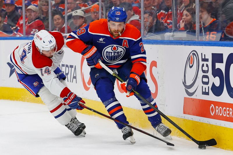 Mar 6, 2025; Edmonton, Alberta, CAN; Edmonton Oilers forward Leon Draisaitl (29) and Montreal Canadiens forward Nick Suzuki (14) battle along the boards for a loose puck during the third period at Rogers Place. Mandatory Credit: Perry Nelson-Imagn Images