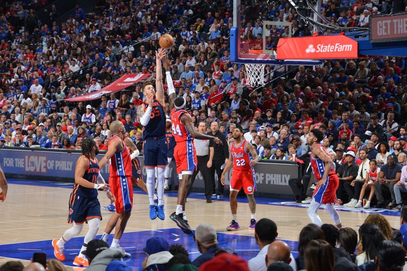 PHILADELPHIA, PA - APRIL 28: Isaiah Hartenstein #55 of the New York Knicks shoots the ball during the game against the Philadelphia 76ers during Round 1 Game 4 of the 2024 NBA Playoffs on April 28, 2024 at the Wells Fargo Center in Philadelphia, Pennsylvania NOTE TO USER: User expressly acknowledges and agrees that, by downloading and/or using this Photograph, user is consenting to the terms and conditions of the Getty Images License Agreement. Mandatory Copyright Notice: Copyright 2024 NBAE (Photo by Jesse D. Garrabrant/NBAE via Getty Images)