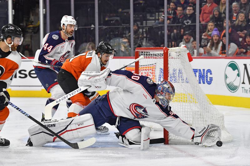 Jan 4, 2024; Philadelphia, Pennsylvania, USA; Columbus Blue Jackets goaltender Daniil Tarasov (40) makes a save against the Philadelphia Flyers during the first period at Wells Fargo Center. Mandatory Credit: Eric Hartline-USA TODAY Sports