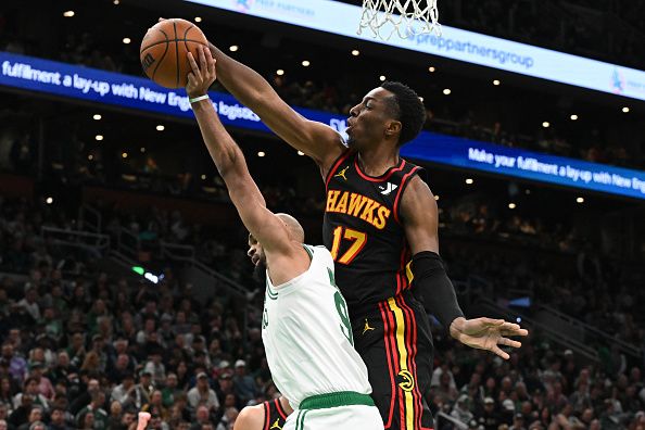 BOSTON, MASSACHUSETTS - NOVEMBER 26: Onyeka Okongwu #17 of the Atlanta Hawks blocks a shot by Derrick White #9 of the Boston Celtics during the third quarter at the TD Garden on November 26, 2023 in Boston, Massachusetts. NOTE TO USER: User expressly acknowledges and agrees that, by downloading and or using this photograph, User is consenting to the terms and conditions of the Getty Images License Agreement. (Photo by Brian Fluharty/Getty Images)