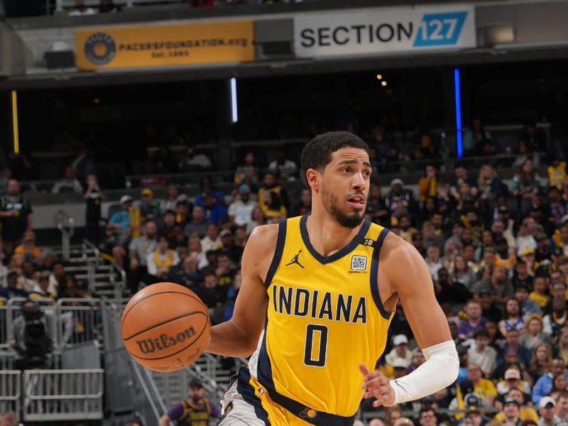 INDIANAPOLIS, IN - MARCH 29: Tyrese Haliburton #0 of the Indiana Pacers dribbles the ball during the game against the Los Angeles Lakers on March 24, 2024 at Gainbridge Fieldhouse in Indianapolis, Indiana. NOTE TO USER: User expressly acknowledges and agrees that, by downloading and or using this Photograph, user is consenting to the terms and conditions of the Getty Images License Agreement. Mandatory Copyright Notice: Copyright 2024 NBAE (Photo by Jesse D. Garrabrant /NBAE via Getty Images)