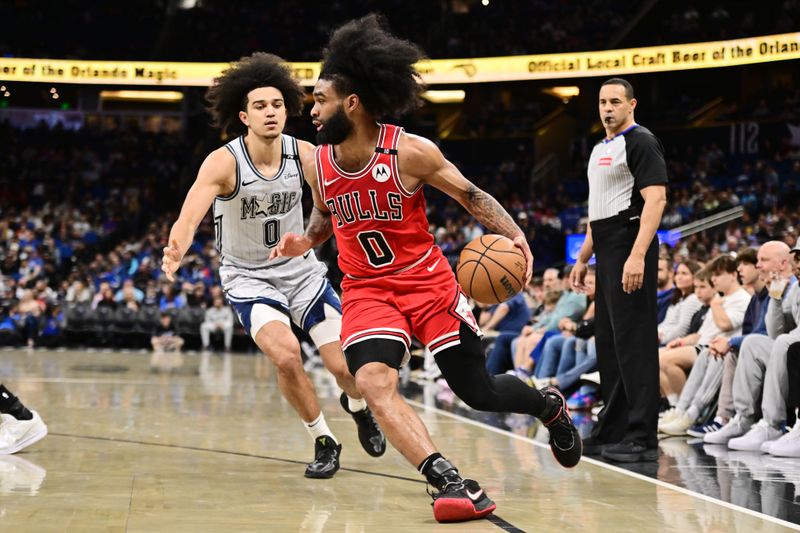 ORLANDO, FLORIDA - MARCH 06: Coby White #0 of the Chicago Bulls around Anthony Black #0 of the Orlando Magic in the second half at Kia Center on March 06, 2025 in Orlando, Florida. NOTE TO USER: User expressly acknowledges and agrees that, by downloading and or using this photograph, User is consenting to the terms and conditions of the Getty Images License Agreement. (Photo by Julio Aguilar/Getty Images)