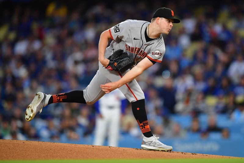 Apr 3, 2024; Los Angeles, California, USA; San Francisco Giants starting pitcher Kyle Harrison (45) throws against the Los Angeles Dodgers during the first inning at Dodger Stadium. Mandatory Credit: Gary A. Vasquez-USA TODAY Sports