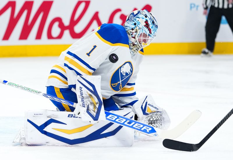 Jan 22, 2026; Montreal, Quebec, CAN; Buffalo Sabres goalie Ukko-Pekka Luukkonen (1) makes a save against the Montreal Canadiens during the first period at the Bell Centre. Mandatory Credit: Eric Bolte-Imagn Images