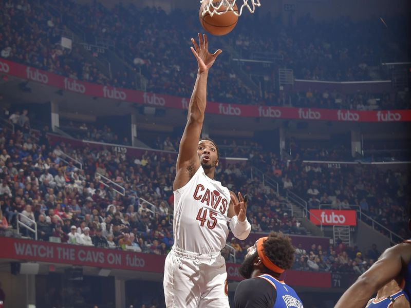 CLEVELAND, OH - MARCH 31:  Donovan Mitchell #45 of the Cleveland Cavaliers goes to the basket during the game on March 31, 2023 at Rocket Mortgage FieldHouse in Cleveland, Ohio. NOTE TO USER: User expressly acknowledges and agrees that, by downloading and/or using this Photograph, user is consenting to the terms and conditions of the Getty Images License Agreement. Mandatory Copyright Notice: Copyright 2023 NBAE (Photo by David Liam Kyle/NBAE via Getty Images)