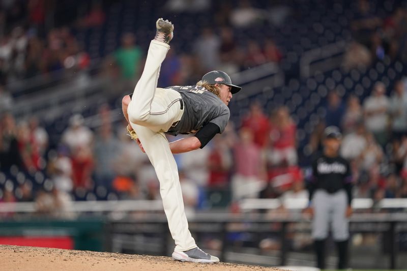 Jun 14, 2024; Washington, District of Columbia, USA; Washington Nationals relief pitcher Jordan Weems (51) throws the ball for the final out against the Miami Marlins in the ninth inning at Nationals Park. Mandatory Credit: Amber Searls-USA TODAY Sports